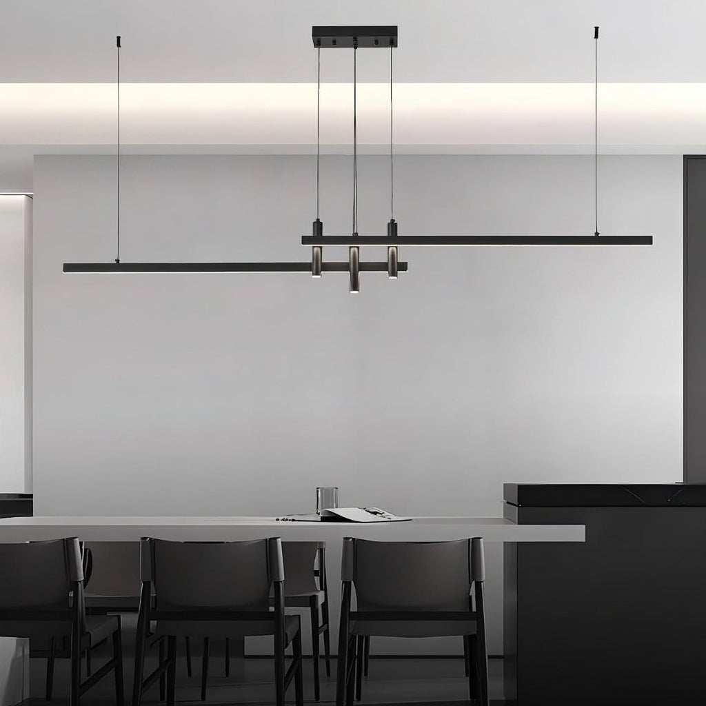 Modern pendant light fixture in a dining room setting with text highlighting features.