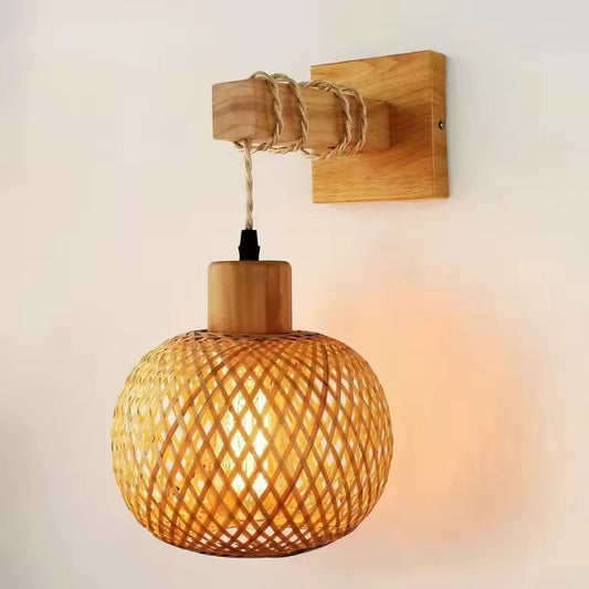 Close-up of hand‑woven bamboo and rattan shade of wall lamp
