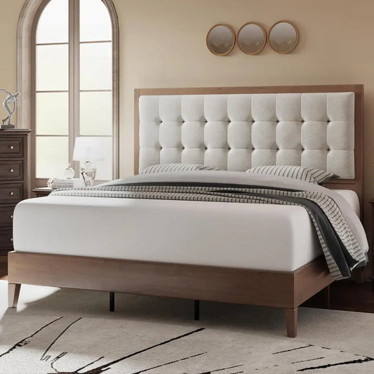 Bedroom with a wooden bed frame, upholstered headboard, and decorative elements.