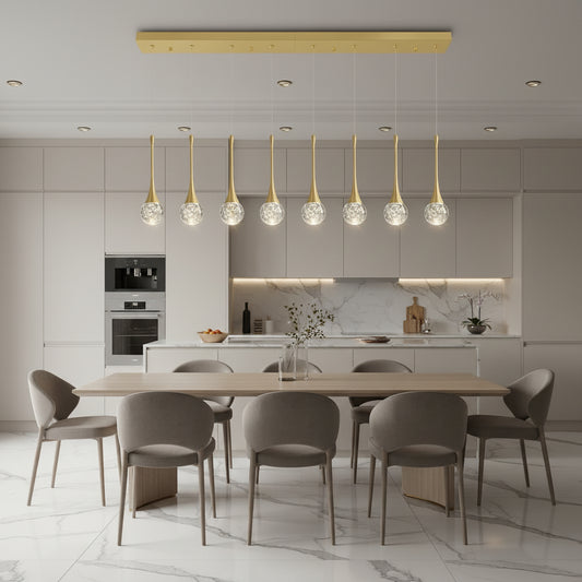 Modern kitchen with pendant lights hanging above a dining table.