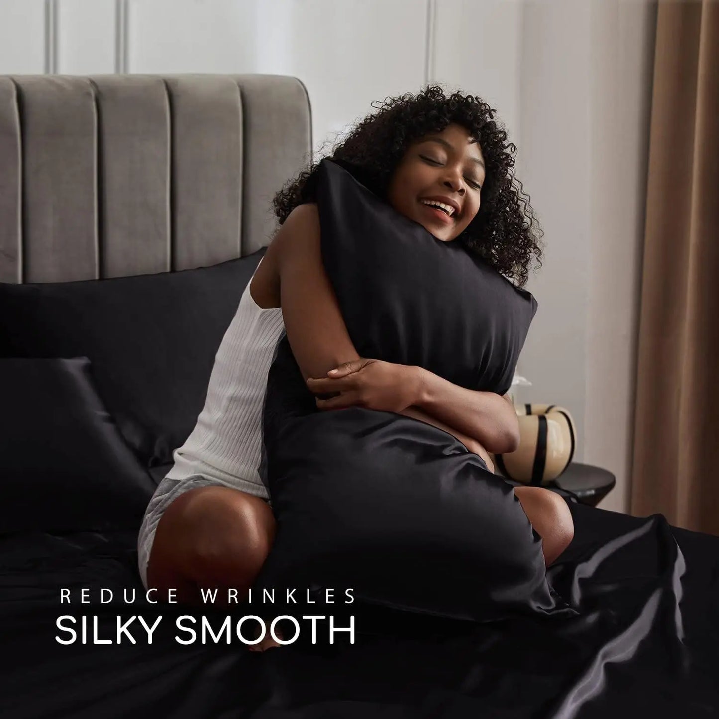 Elegant black satin sheet set with black pillowcases from CloudSatin Dream collection.