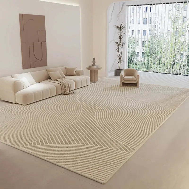 Large rug and couch in a living room featuring cozy stripe living room carpet.