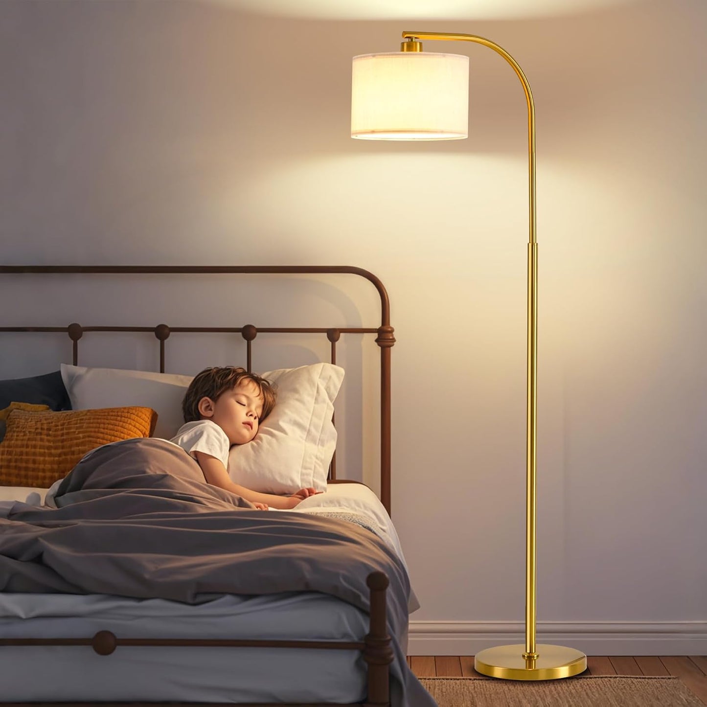Child sleeping in bed with a gold floor lamp in a bedroom