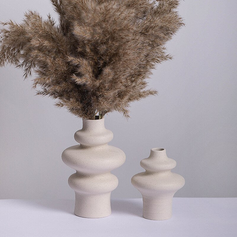 The handmade finish adds a unique touch, making each vase one of a kind.