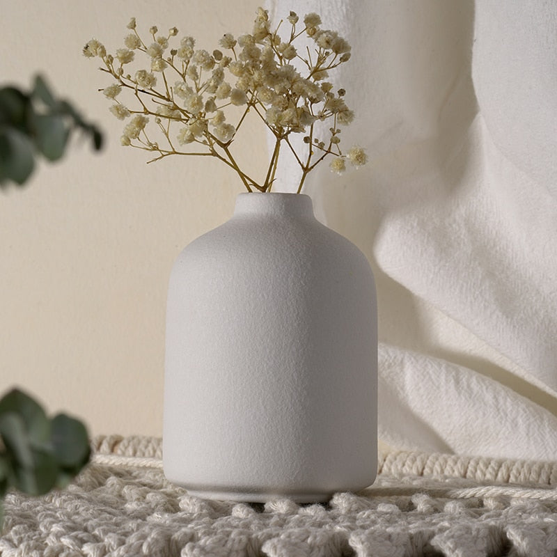 white flower vase