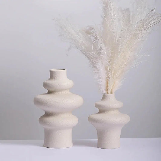 Bring a touch of elegance to your living space with this Ceramic Handmade Vase. Made from high-quality ceramic and porcelain materials, a unique touch.