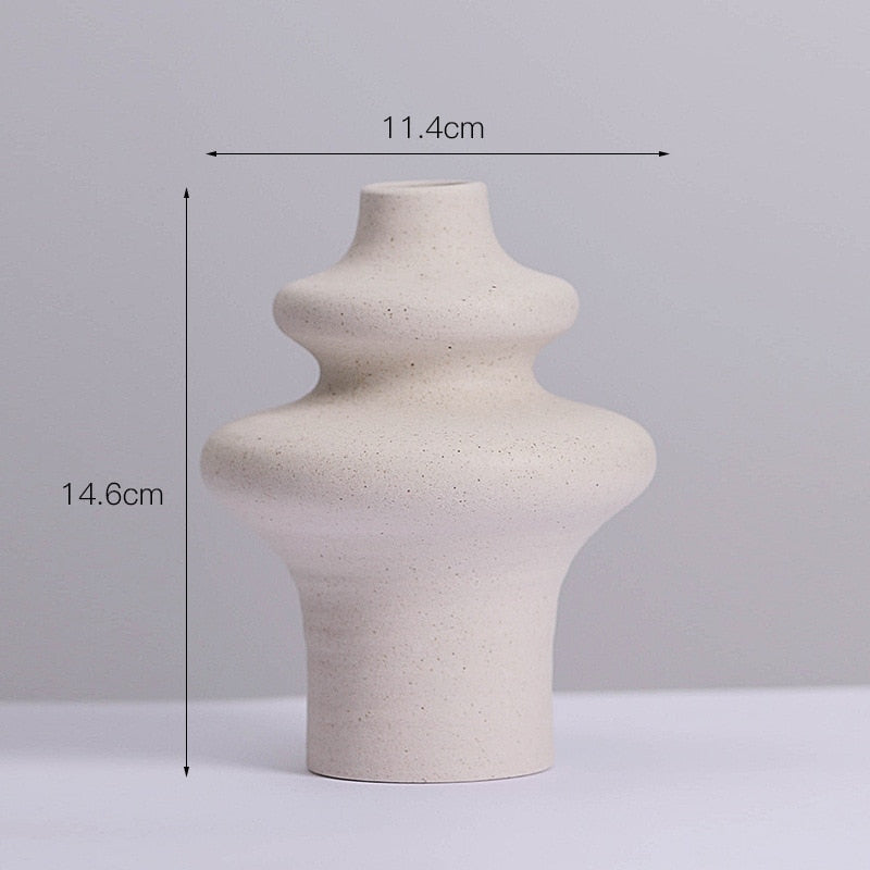 The medium size (15-25cm) is perfect for tabletop use, making it an ideal choice for displaying flowers or other decorative items.