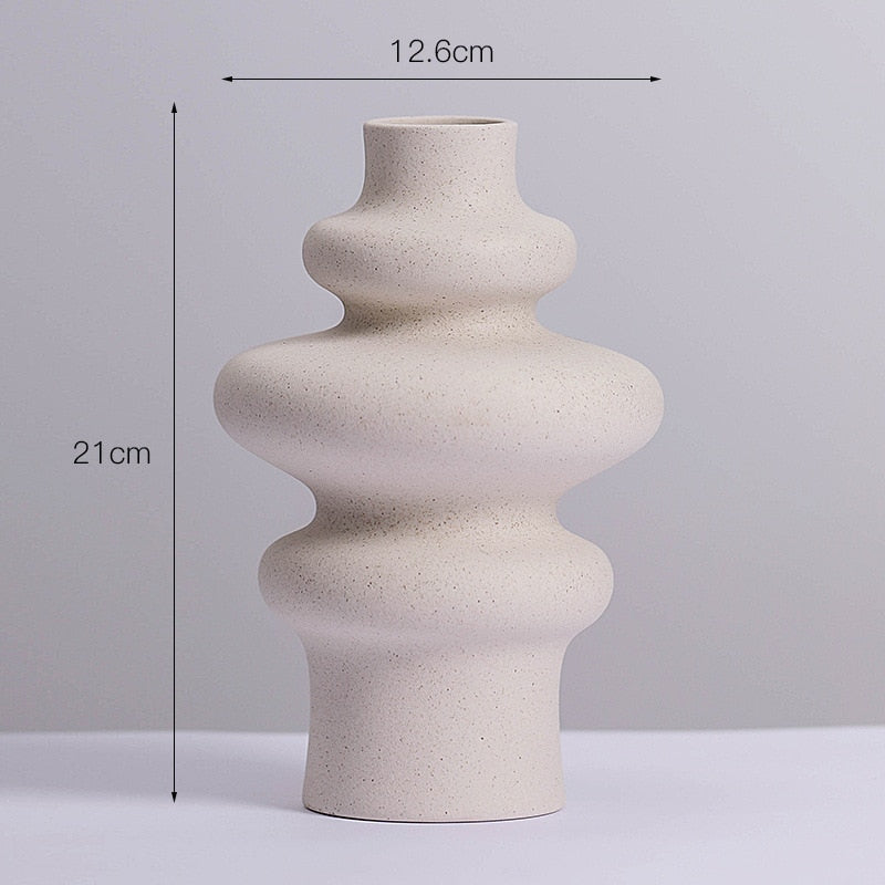 The medium size (15-25cm) is perfect for tabletop use, making it an ideal choice for displaying flowers or other decorative items.