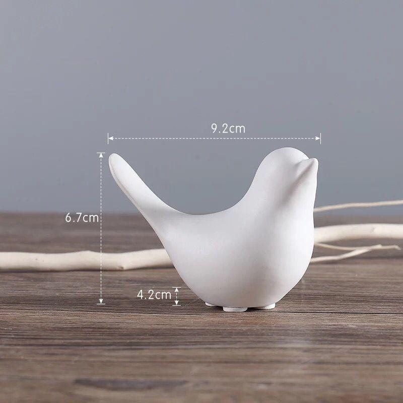 white bird vase