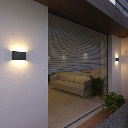 outdoor wall lights on a white wall with up and down light direction