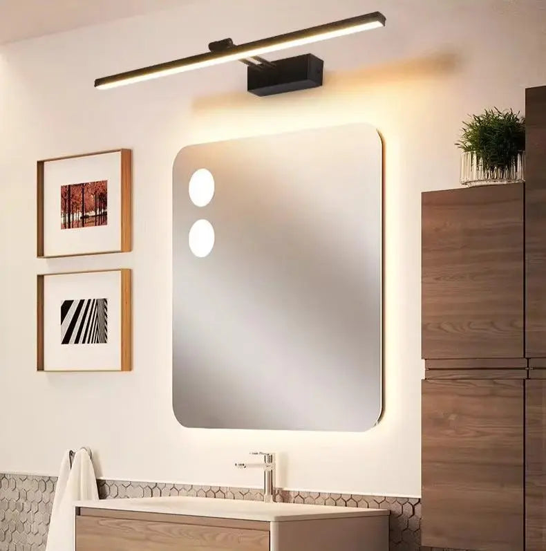 black vanity battery operated wall sconce over vanity mirror