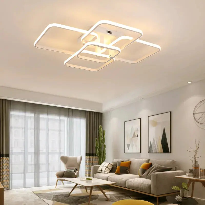 rectangular shape acrylic chandeliers above the sofas and coffee table