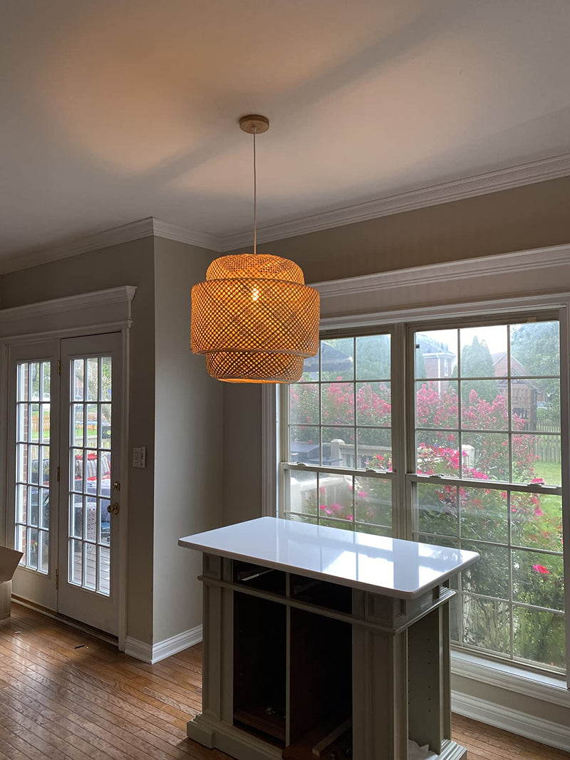 Living room with a wicker pendant light and large window
