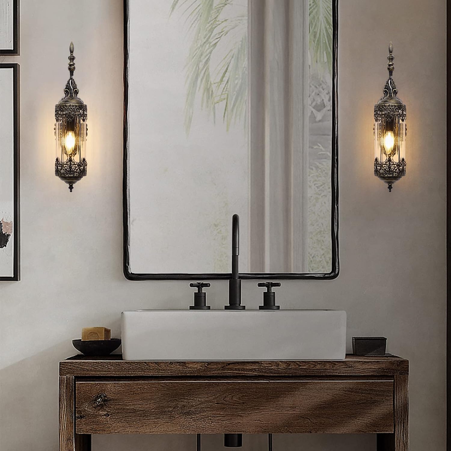 two pair of mid century wall sconces install on a bathroom vanity wall