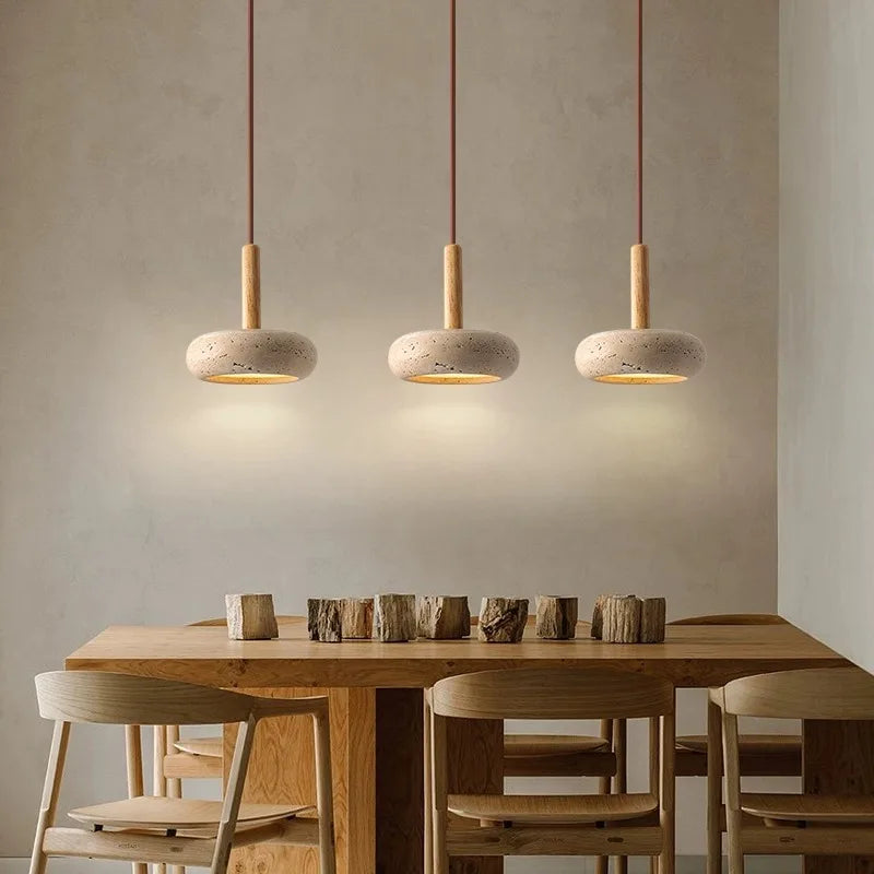 wabi sabi pendant lights above dining table