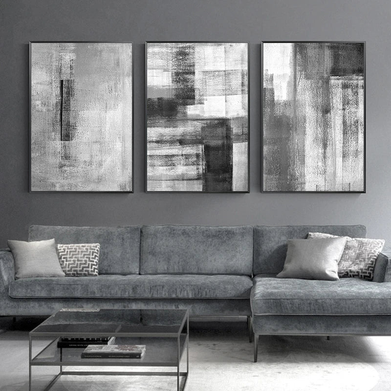 black and white canvas wall art hanging above on sofa wall