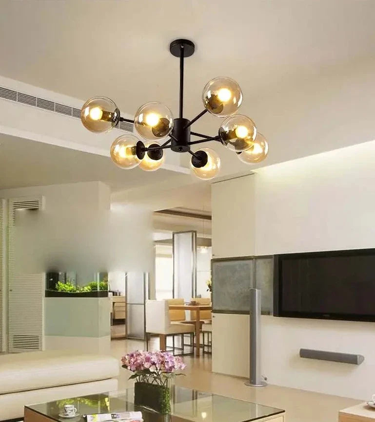 modern black chandeliers over kitchen island