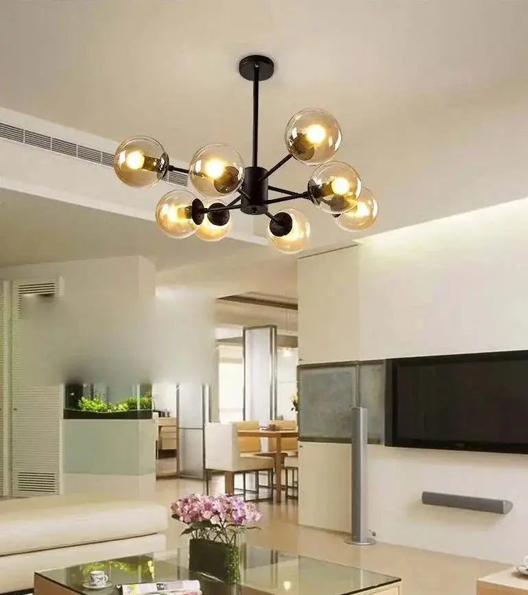 modern black chandeliers over kitchen island