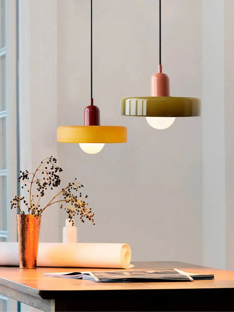 stained glass pendant lights over study table