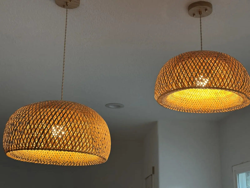 rattan pendant lights hanging on a ceiling