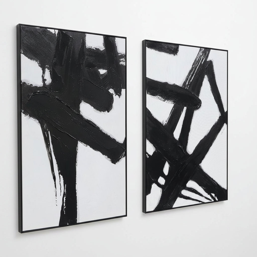 Two abstract black and white artworks on a white background