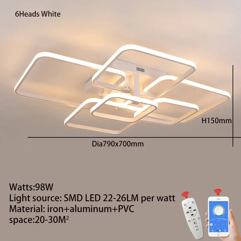 Acrylic rectangle chandelier with included remote control resting on wooden dining table