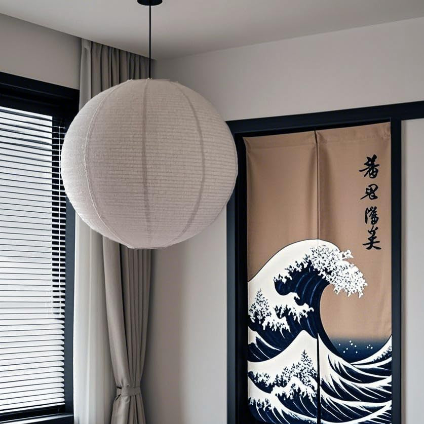 Modern interior with a lamp, curtains, and a decorative screen with wave design.