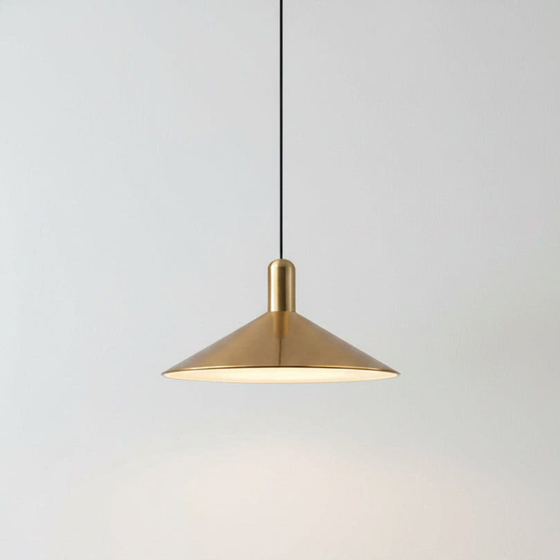 Gold pendant light on a white background