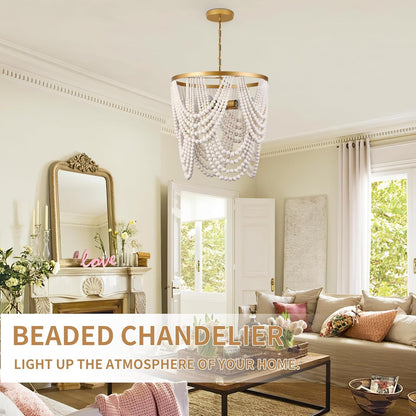 Beaded chandelier hanging in a living room with decor elements.