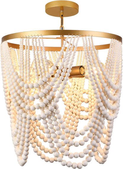 Chandelier with gold frame and white beads on a white background