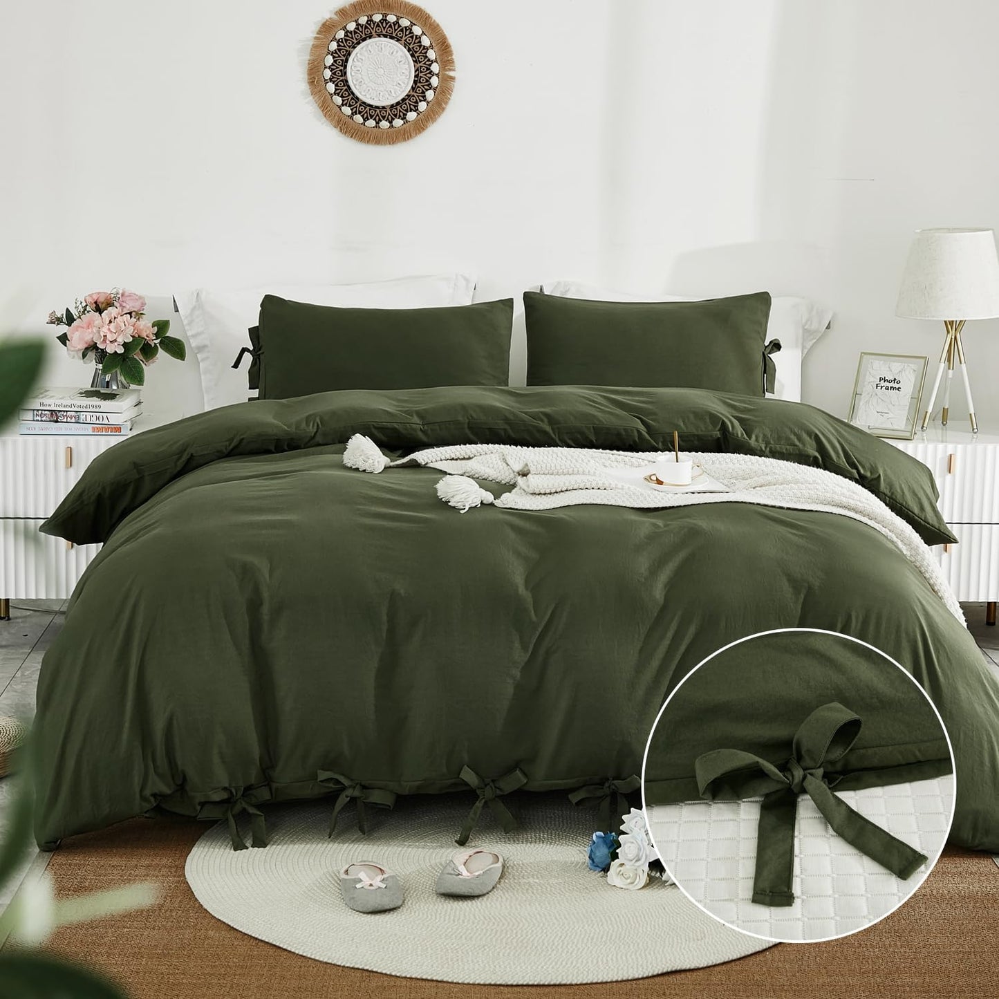 Green bedspread set on a bed in a bedroom with decorative elements.
