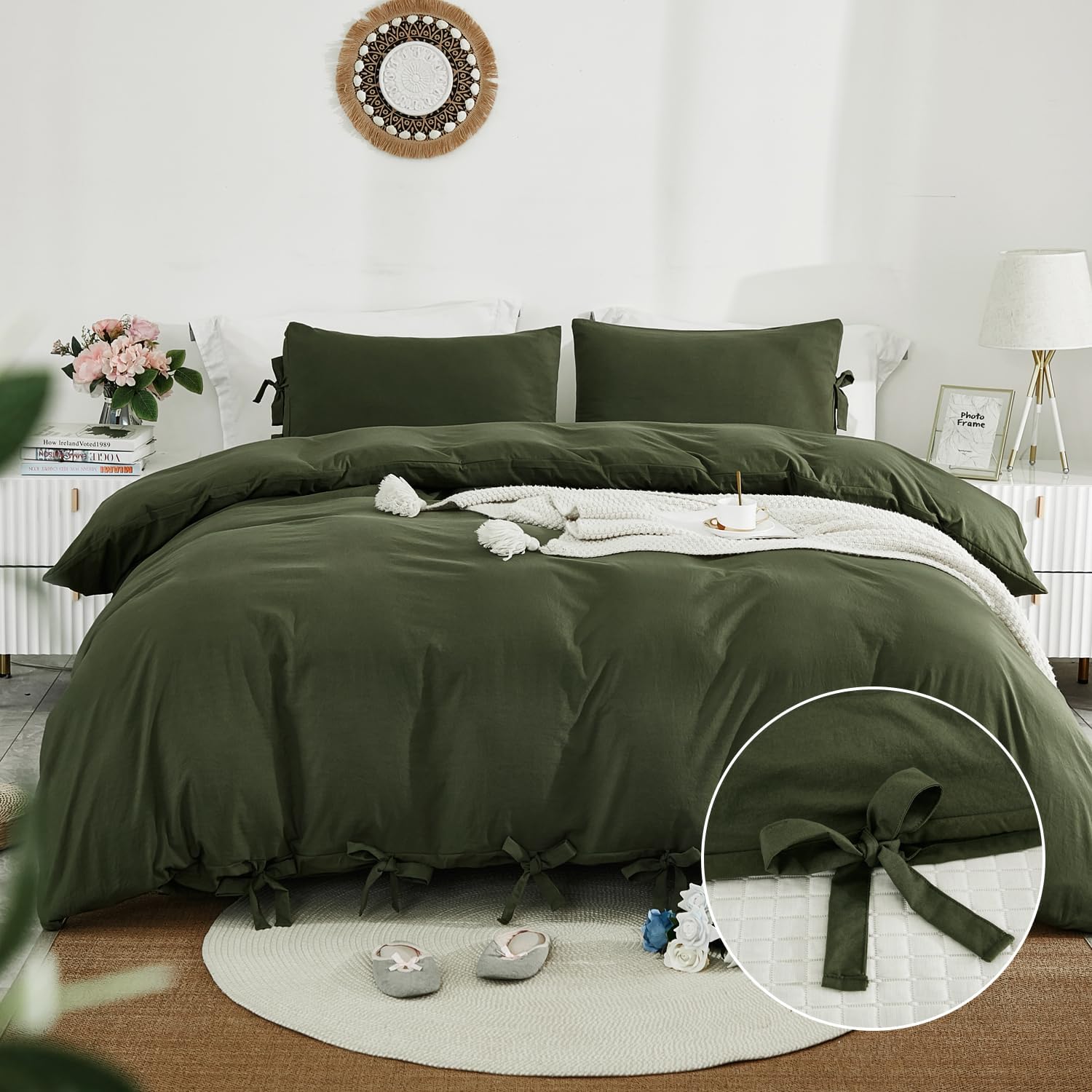 Green bedspread set on a bed in a bedroom with decorative elements.