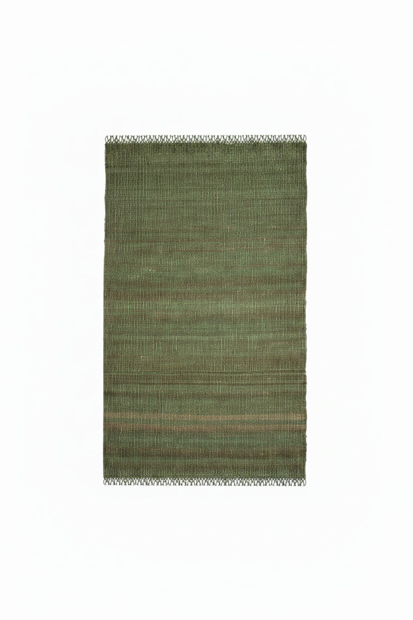 Green woven rug with a textured pattern