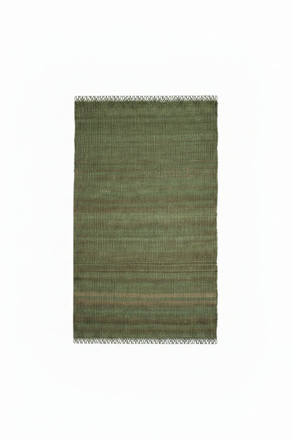 Green woven rug with a textured pattern