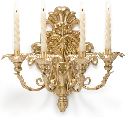 Gold ornate wall sconce with four candle-like lights on a white background