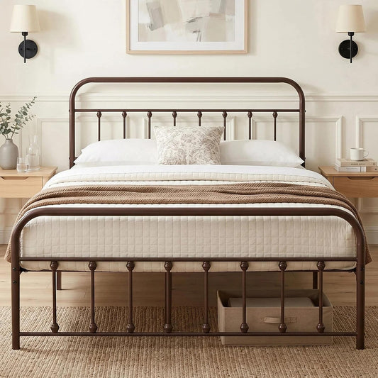 A dark brown metal bed frame with a curved headboard and footboard, styled with white bedding and a brown throw blanket in a bright, neutral bedroom.
