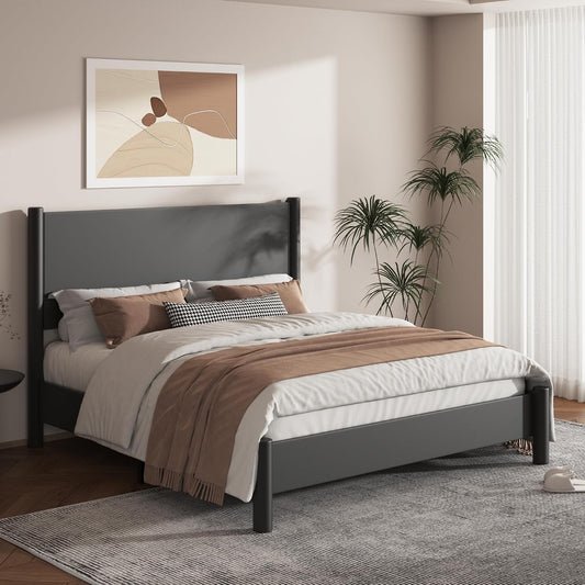 A dark gray upholstered bed frame with a tall rectangular headboard and matching footboard, styled in a modern bedroom with white bedding, brown throw blanket, gray rug, and a framed abstract print on the wall.