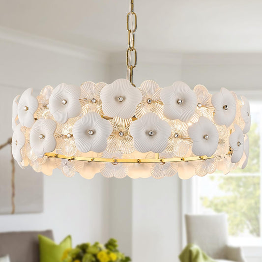 Floral chandelier with white flowers and gold accents in a room setting.
