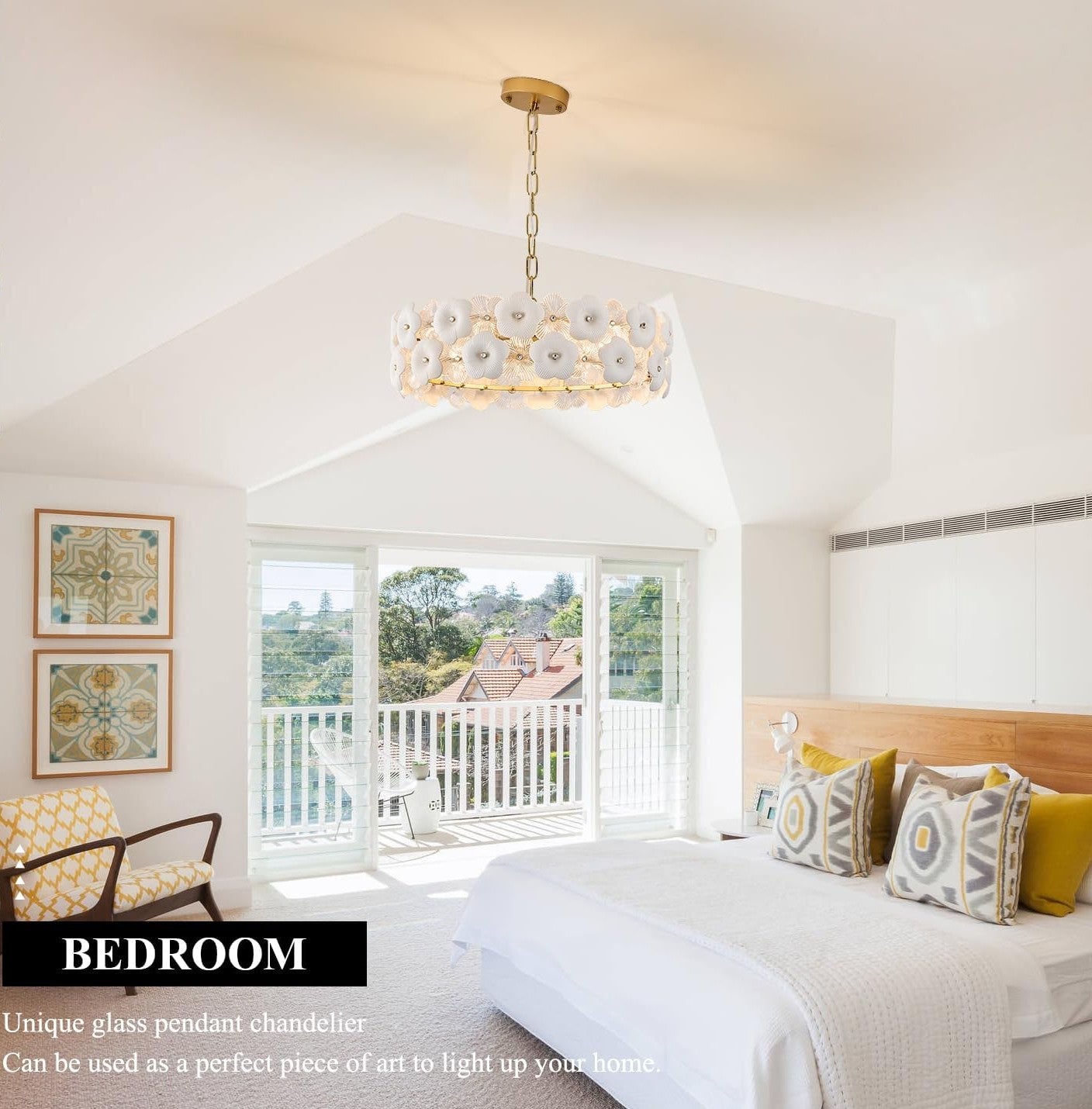 Modern bedroom with a unique glass pendant chandelier, bed, and decor.