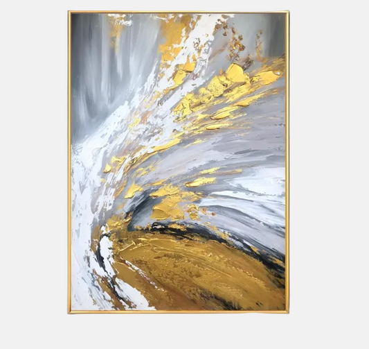 Abstract framed wall art featuring sweeping brushstrokes of white, gray, gold, and brown, presented in a thin gold frame against a light gray background.