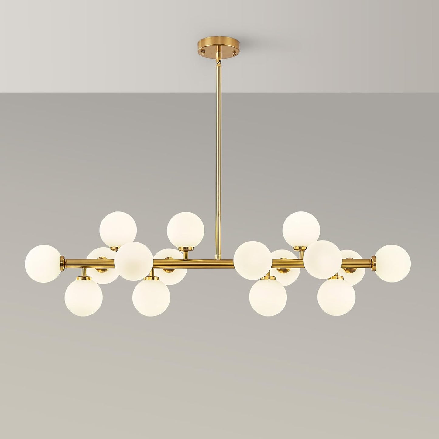 Modern chandelier with gold frame and white glass bulbs on a gray background