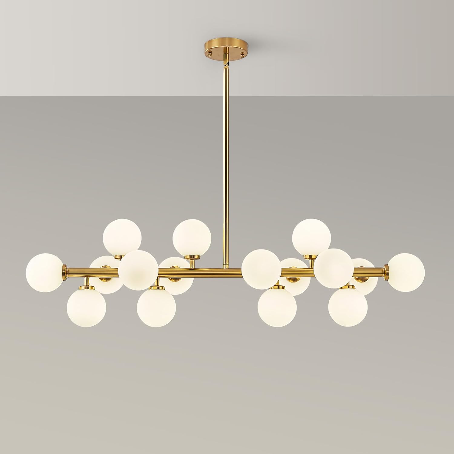 Modern chandelier with gold frame and white glass bulbs on a gray background