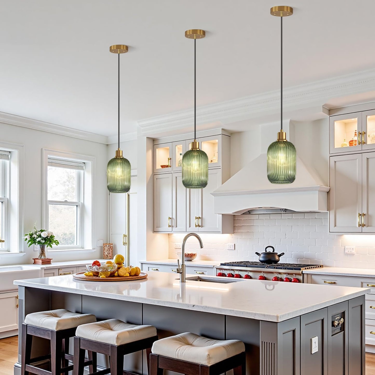 Modern kitchen with pendant lights, island, and stools