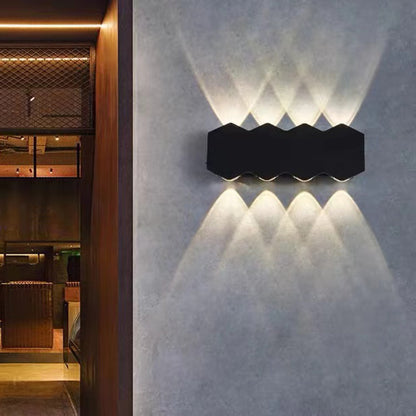 With four lights, the Trilight Glow LED Wall Sconce beautifully lights up the outdoor wall.