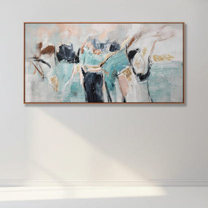 A framed abstract canvas painting featuring figures in teal, black, white, and beige tones, hung on a light gray wall with soft sunlight casting a shadow below.