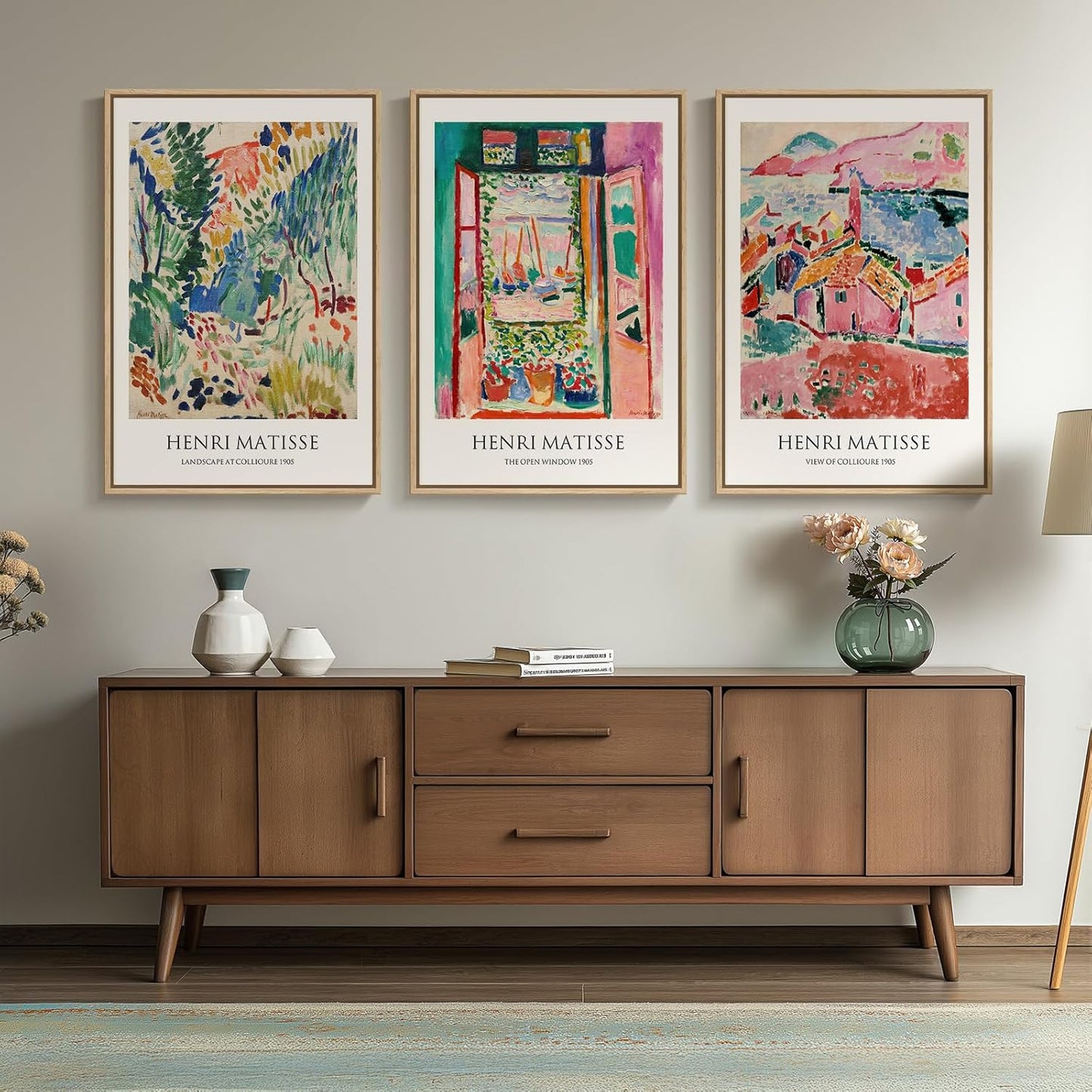 Wooden sideboard with Henri Matisse art prints on a wall