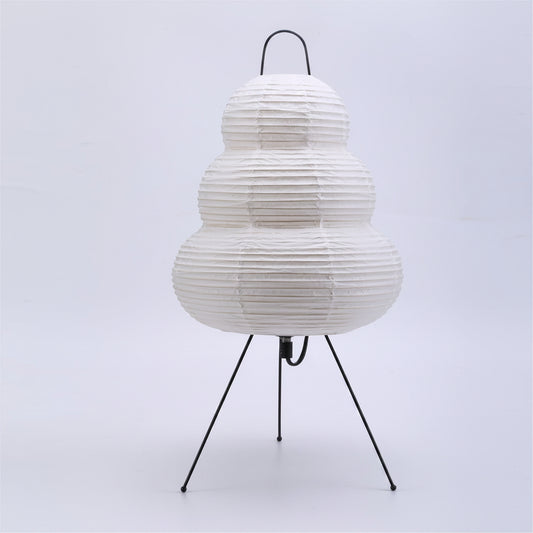 White paper lantern on a stand with dimensions indicated on a light gray background