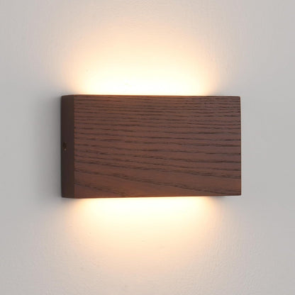 Wooden wall light fixture on a plain wall