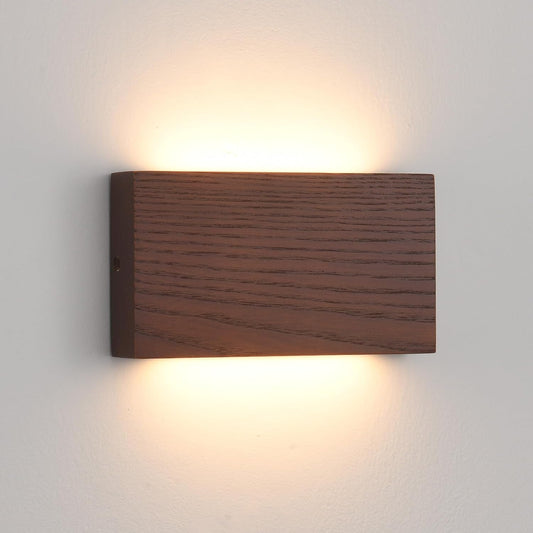 Wooden wall light fixture on a plain wall