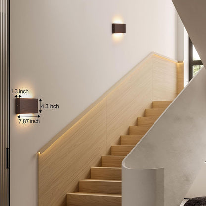 Modern staircase with wall-mounted lights and measurements indicated.